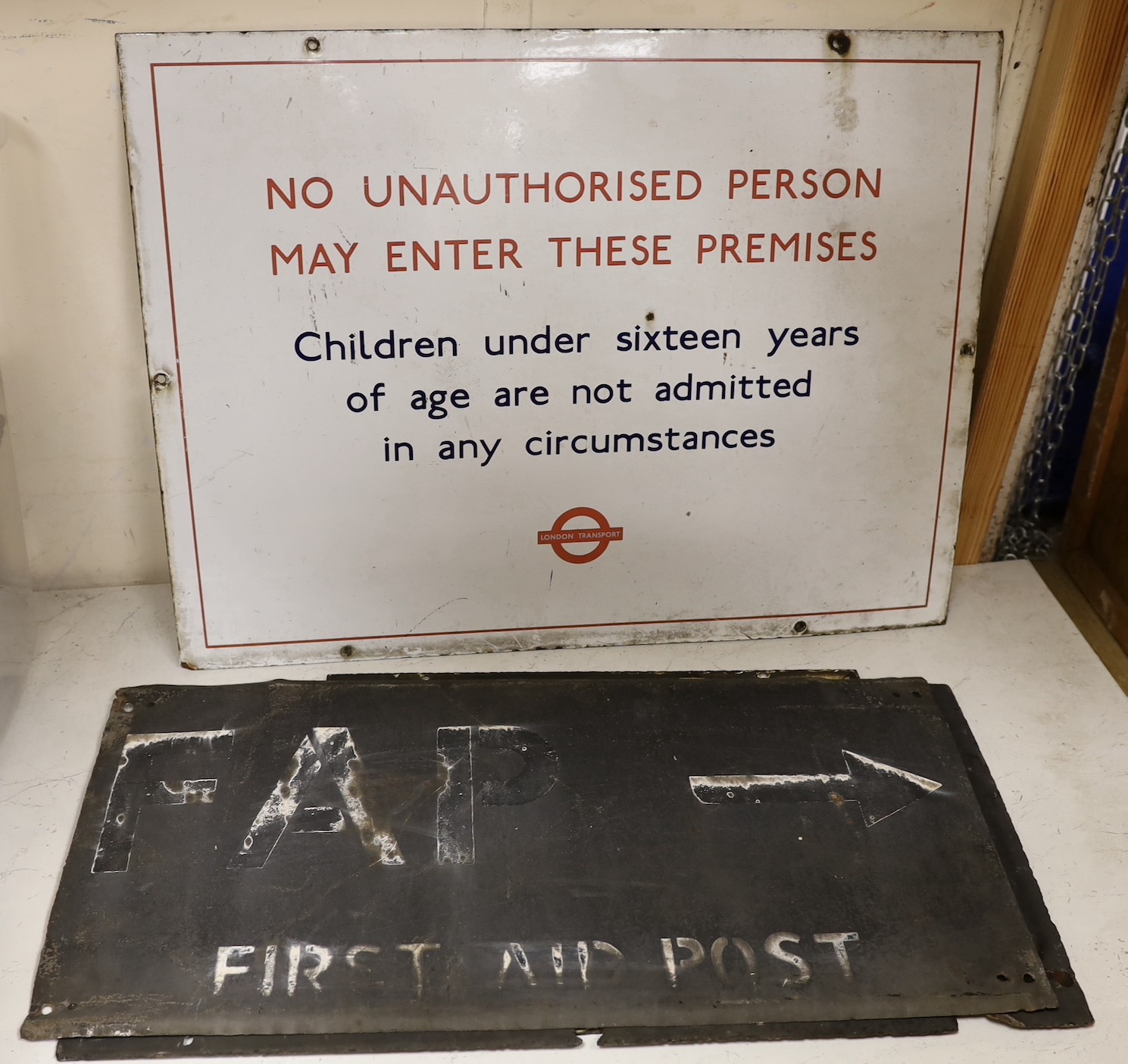 A World War Two Southern Railway Evacuation sign ‘Evacuation of women and children from London, Etc.’, wood mount 124 x 92cm, and five further metal signs